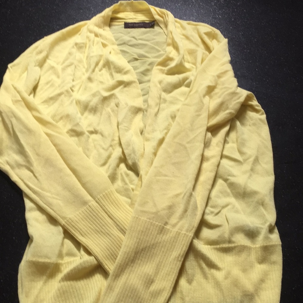 Waisted cross sweater